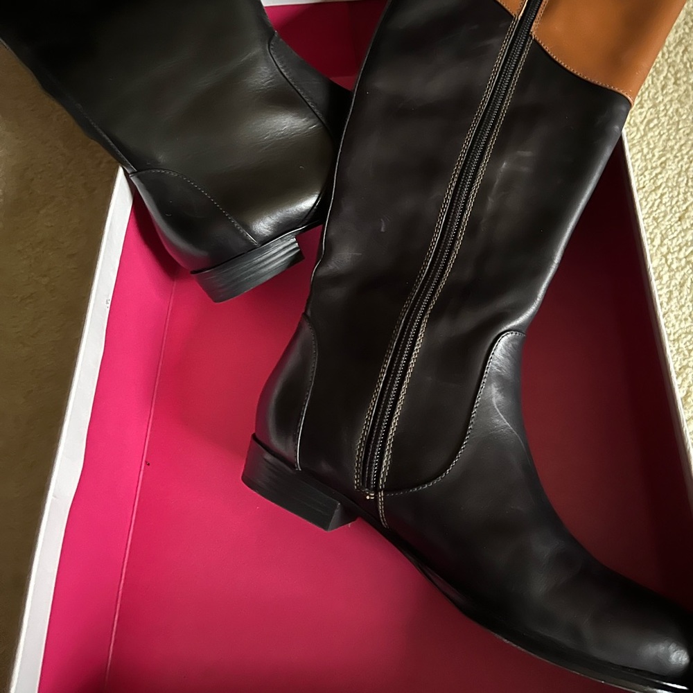 Knee high boots, never worn.